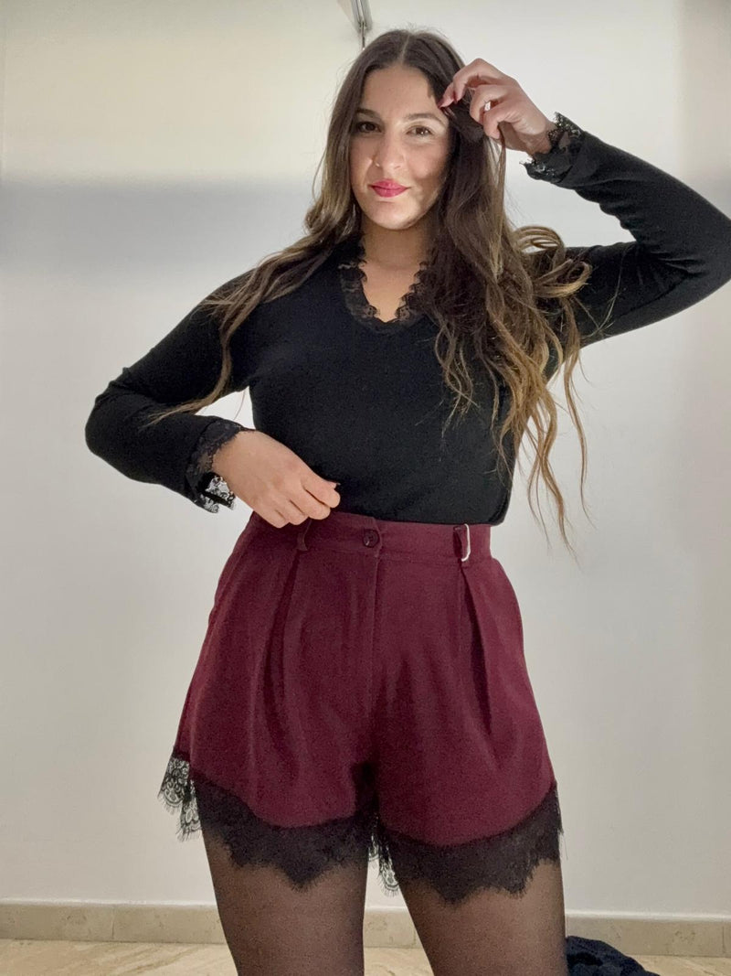 Pantaloncini con ricamo